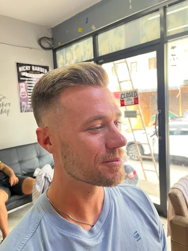 Blond customer with neat side fade